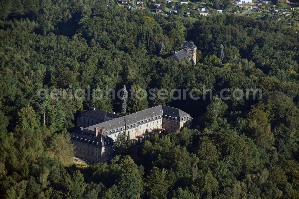 Bad Schlema from above - Former sanatorium in a forest in Bad Schlema in the state of Saxony. The sanatorium was opened in the 1950s by SDAG Wismut and is empty today