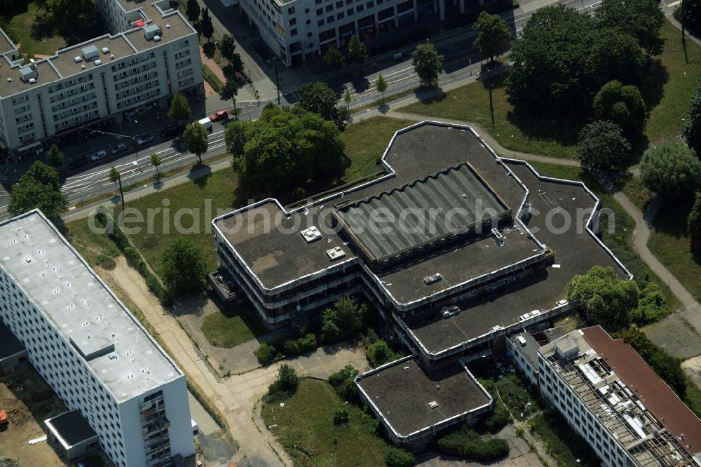 Berlin from above - Former sports hotel on the Southern end of the Sportforum Hohenschoenhausen in the Alt-Hohenschoenhausen part of the district of Lichtenberg in Berlin in Germany. The second largest sports and training facilities of Berlin includes the former - decaying - hotel