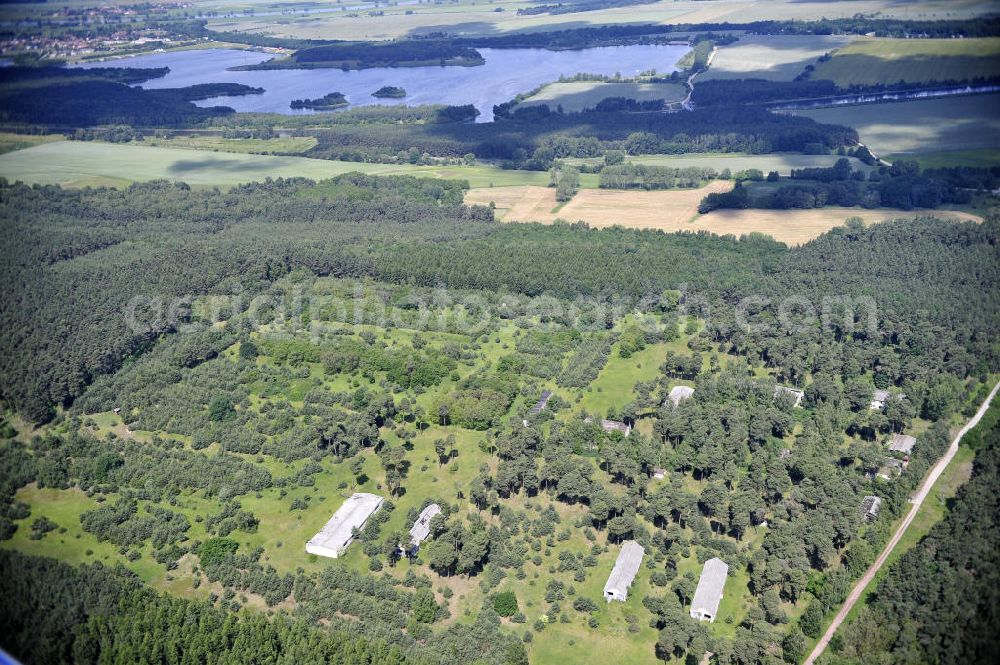 Detershagen from the bird's eye view: Blick auf ein ehemaliges Tanklager der NVA Nationale Volksarmee der DDR südlich des Elbe-Havel-Kanals bei Detershagen in Sachsen-Anhalt. View of a former tank farm of the NVA in the GDR National People's Army south of the Elbe-Havel canal to Deter Hagen in Saxony-Anhalt.