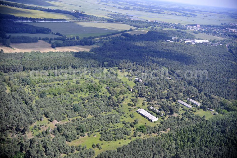 Detershagen from the bird's eye view: Blick auf ein ehemaliges Tanklager der NVA Nationale Volksarmee der DDR südlich des Elbe-Havel-Kanals bei Detershagen in Sachsen-Anhalt. View of a former tank farm of the NVA in the GDR National People's Army south of the Elbe-Havel canal to Deter Hagen in Saxony-Anhalt.