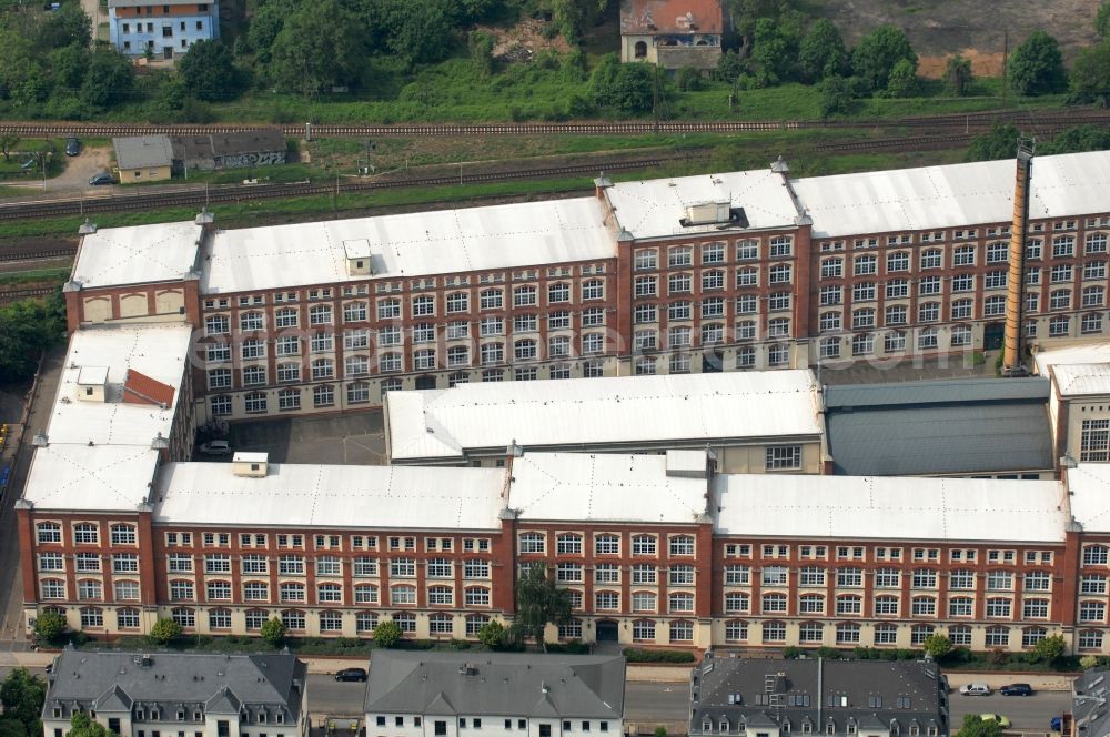 Aerial image Dresden - Building complex of the former packaging supplies plant in the district Pieschen at the street Riesaer Strasse in Saxony. The partially rebuilt and renovated buildings are now used as an office building