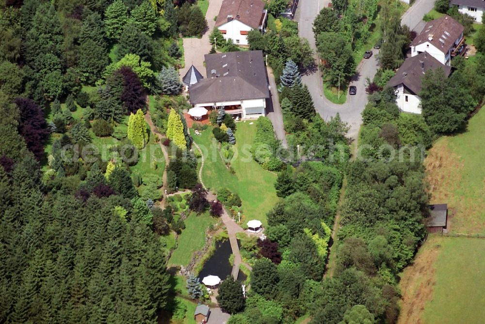 Lennestadt from the bird's eye view: Single and multi-family homes in the valley on the outskirts of Lennestadt in North Rhine-Westphalia