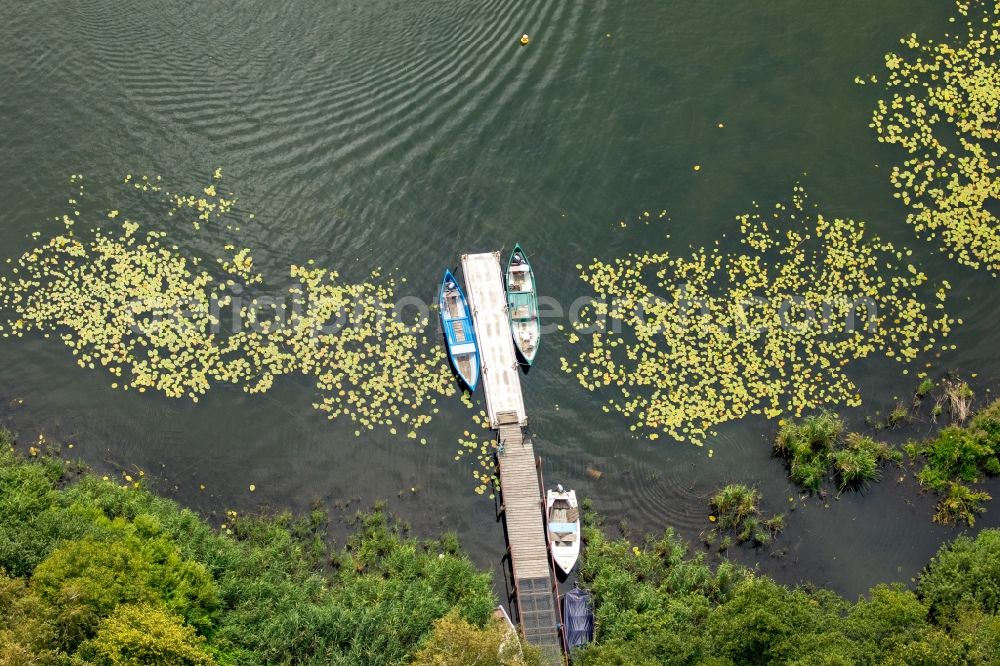 Aerial image Waren (Müritz) - A land at riparian zones on the course of the river des Reeckkanals in Waren (Mueritz) in the state Mecklenburg - Western Pomerania