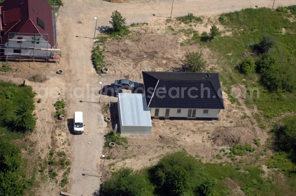 Magdeburg from the bird's eye view: Blick auf das Einfamilien- Wohnneubaugebiet Am Birnengarten in Magdeburg-Ottersleben, mit Planfläche, auf der weitere Einfamilienhäuser entstehen. Kontakt: MAWOG Grundstücks GmbH, Am Birnengarten 19 c, 39116 Magdeburg, Tel. +49 (0)391 611653-0, Fax +49 (0)391 611653-26, email: Info@am-birnengarten.de