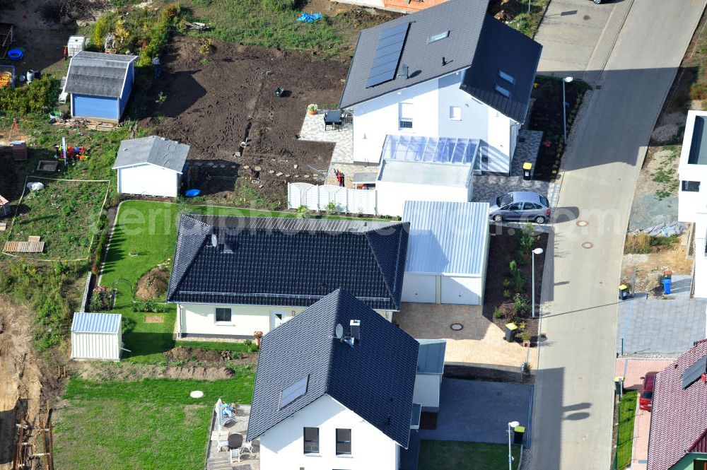 Magdeburg from above - Blick auf das Einfamilien- Wohnneubaugebiet Am Birnengarten in Magdeburg-Ottersleben, mit Planfläche, auf der weitere Einfamilienhäuser entstehen. Kontakt: MAWOG Grundstücks GmbH