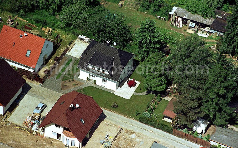 Aerial photograph Mahlow - Einfamilienhaus von Herrn Peter Wartig / Albatros-Flug GmbH an der Bahnhofsstraße in Mahlow / Brandenburg.