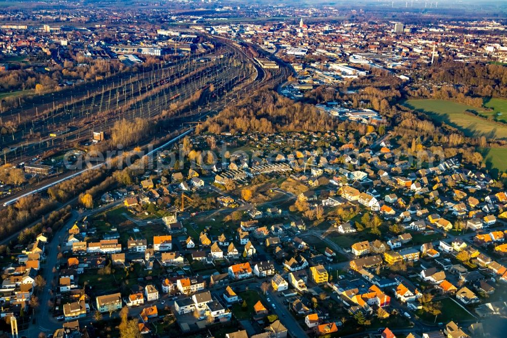 Hamm from the bird's eye view: Construction site for the new construction of a detached house in a family house - settlement along the on Buschstrasse - Guenterstrasse in the district Lohauserholz in Hamm in the state North Rhine-Westphalia, Germany