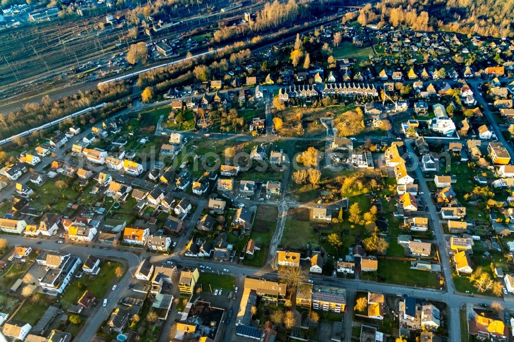 Aerial photograph Hamm - Construction site for the new construction of a detached house in a family house - settlement along the on Buschstrasse - Guenterstrasse in the district Lohauserholz in Hamm in the state North Rhine-Westphalia, Germany