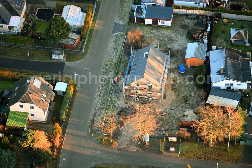 Vogelsdorf from above - Construction site for the new construction of a detached house in a family house - settlement along the Heideweg corner Friedrich-Ebert-Strasse in Vogelsdorf in the state Brandenburg, Germany