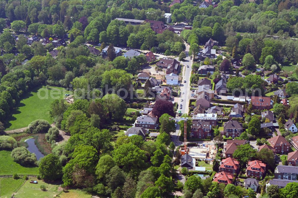 Hamburg from above - Construction site for the new construction of a detached house in a family house - settlement along the Melhopweg corner Alte Dorfstrasse in the district Ohlstedt in Hamburg, Germany