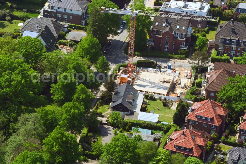 Hamburg from the bird's eye view: Construction site for the new construction of a detached house in a family house - settlement along the Melhopweg corner Alte Dorfstrasse in the district Ohlstedt in Hamburg, Germany