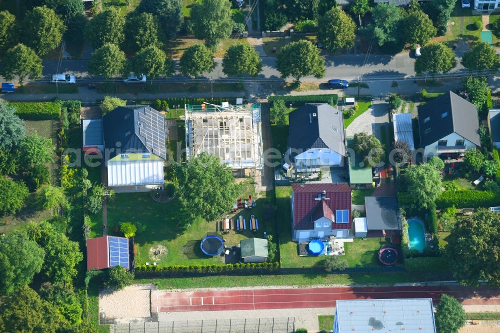 Berlin from above - Construction site for the new construction of a detached house in a family house - settlement along the Bergedorfer Strasse in the district Kaulsdorf in Berlin, Germany