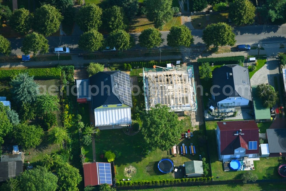 Berlin from above - Construction site for the new construction of a detached house in a family house - settlement along the Bergedorfer Strasse in the district Kaulsdorf in Berlin, Germany