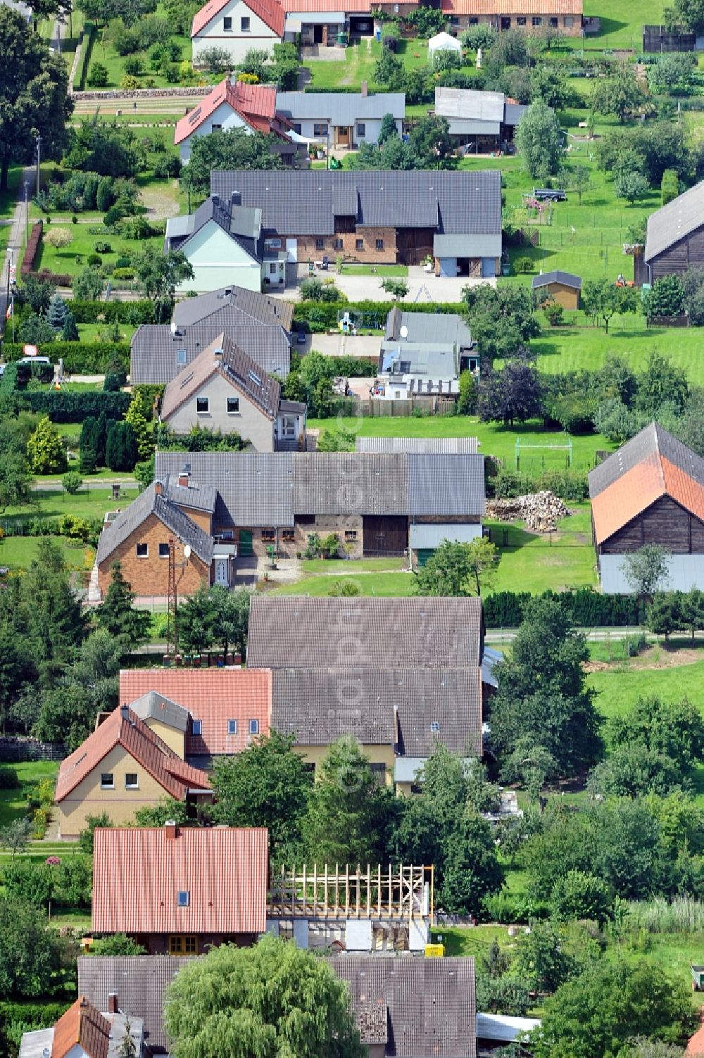 Tessin from above - Detached houses along Gnoiener St in Vilz, a district of Tessin in Mecklenburg Western Pomerania