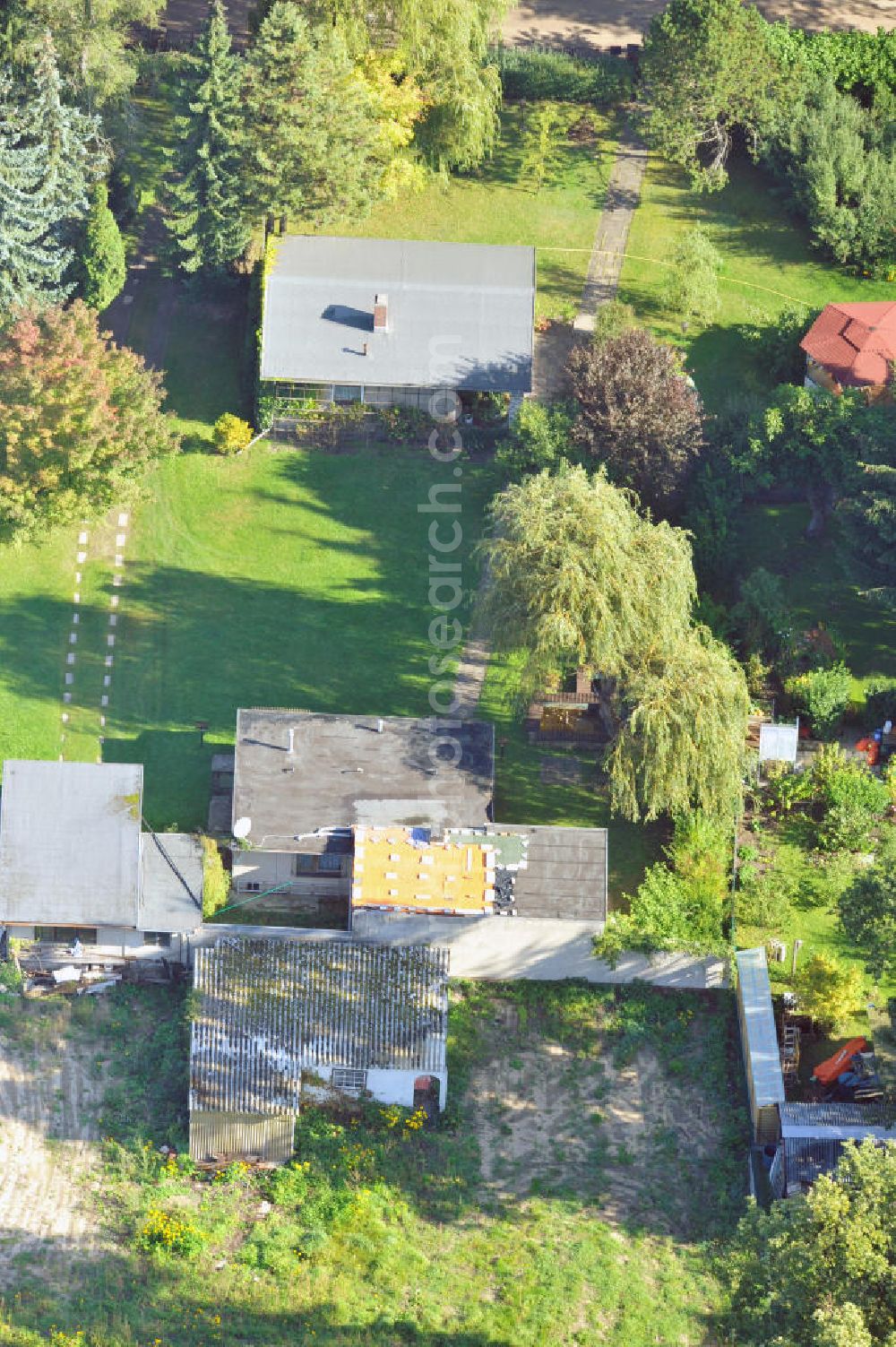 Aerial photograph Vogelsdorf zu Fredersdorf - Einfamilienwohnhäuser im Wohngebiet am Heideweg / Beppo-Römer-Straße in Vogelsdorf.