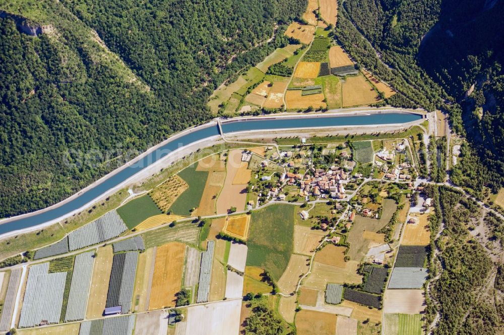 Aerial photograph Rochebrune - Fields and entrance to the underground canal in Rochebrune in Provence-Alpes-Cote d'Azur, France