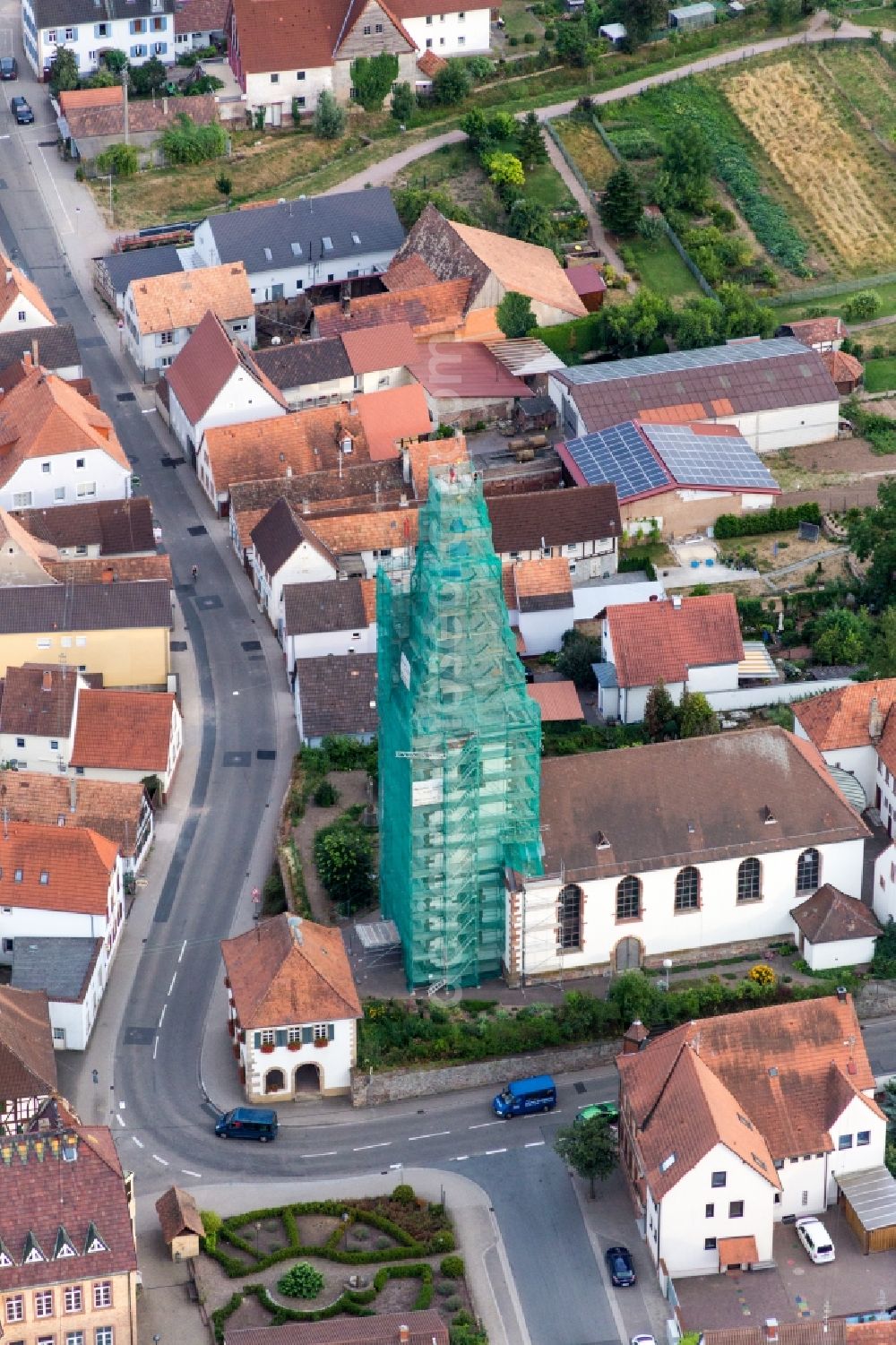 Ottersheim bei Landau from the bird's eye view: Church tower and tower roof of der catholic church in Ottersheim bei Landau in the state Rhineland-Palatinate, Germany