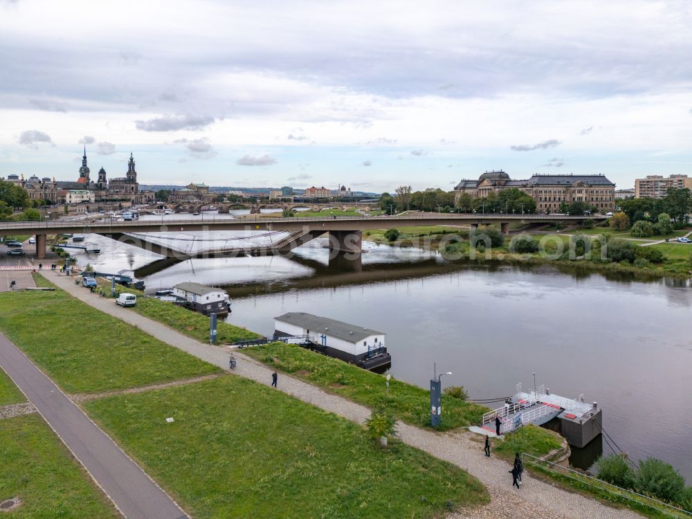 Dresden from above - Concrete segments of the collapsed river bridge structure for crossing the Elbe Carolabruecke on the street Carolabruecke in Dresden in the federal state of Saxony, Germany, have fallen down into the riverbed of the Elbe