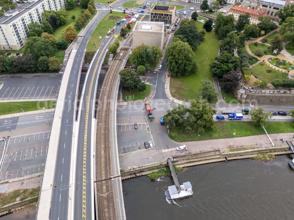 Aerial image Dresden - Concrete segments of the collapsed river bridge structure for crossing the Elbe Carolabruecke on the street Carolabruecke in Dresden in the federal state of Saxony, Germany, have fallen down into the riverbed of the Elbe