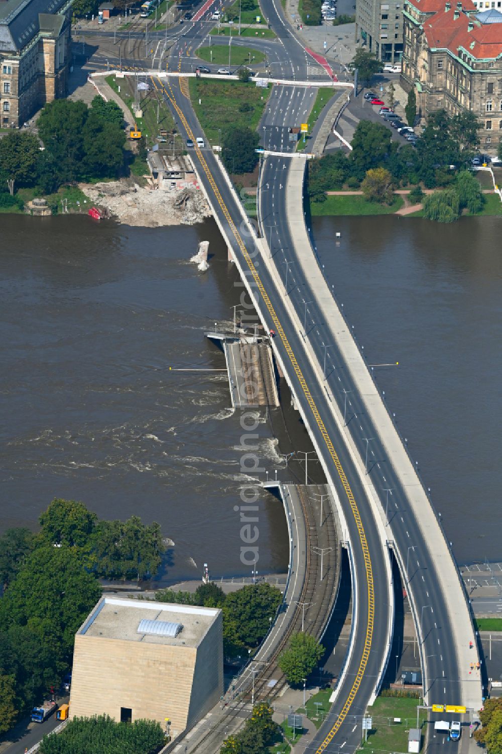 Aerial photograph Dresden - Concrete segments of the collapsed river bridge structure for crossing the Elbe Carolabruecke on the street Carolabruecke in Dresden in the federal state of Saxony, Germany, have fallen down into the riverbed of the Elbe