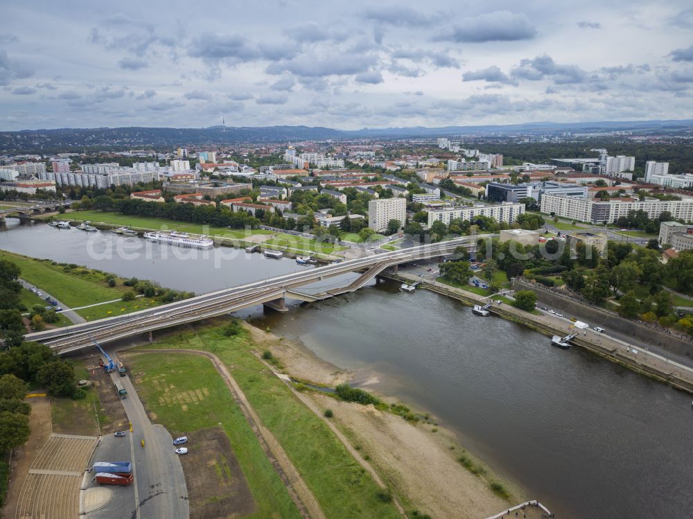 Dresden from the bird's eye view: Concrete segments of the collapsed river bridge structure for crossing the Elbe Carolabruecke on the street Carolabruecke in Dresden in the federal state of Saxony, Germany, have fallen down into the riverbed of the Elbe