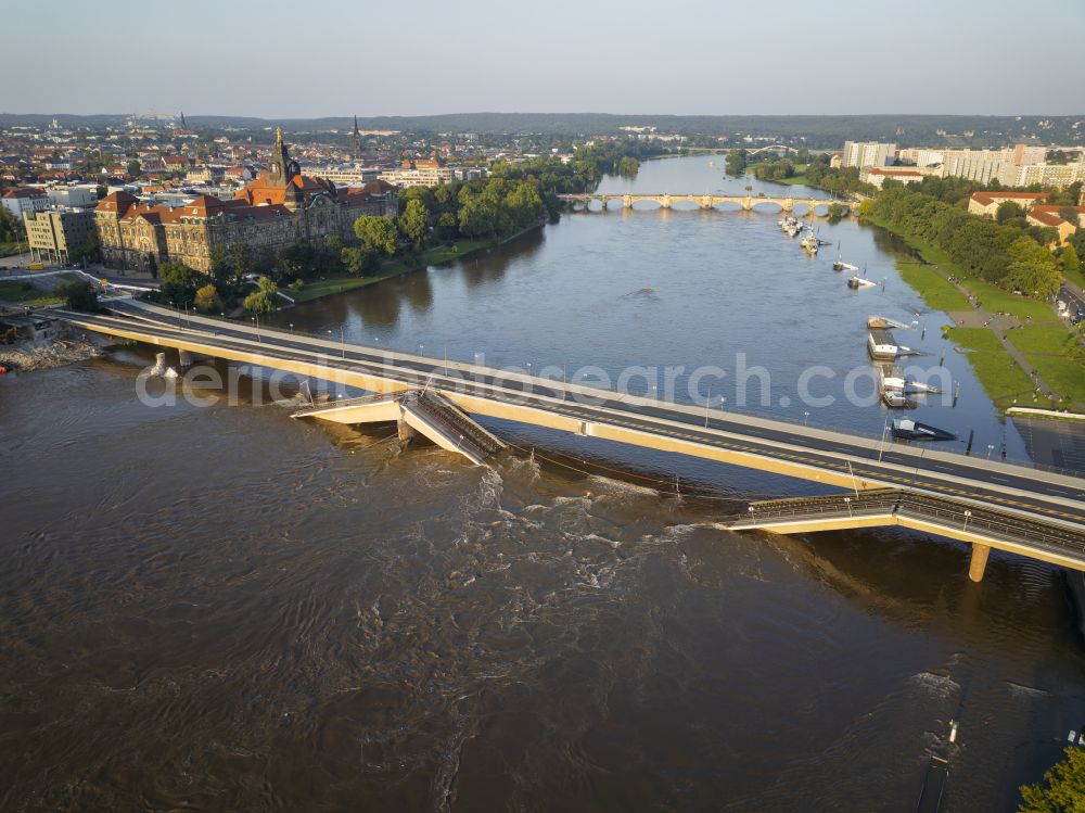 Dresden from the bird's eye view: Concrete segments of the collapsed river bridge structure for crossing the Elbe Carolabruecke on the street Carolabruecke in Dresden in the federal state of Saxony, Germany, have fallen down into the riverbed of the Elbe