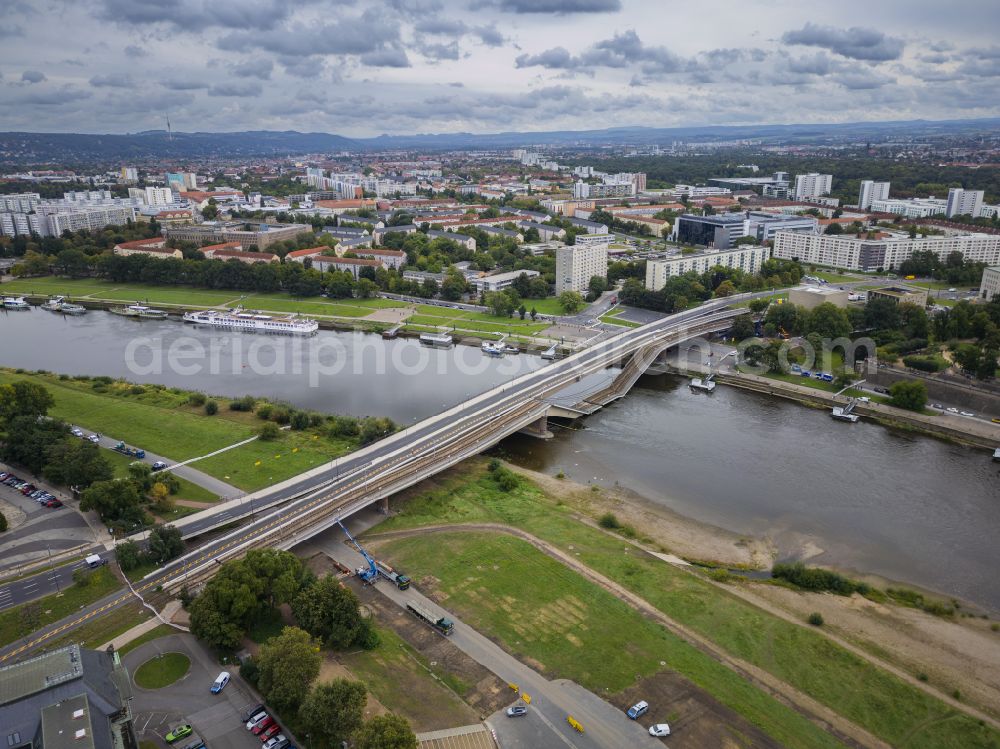 Dresden from the bird's eye view: Concrete segments of the collapsed river bridge structure for crossing the Elbe Carolabruecke on the street Carolabruecke in Dresden in the federal state of Saxony, Germany, have fallen down into the riverbed of the Elbe