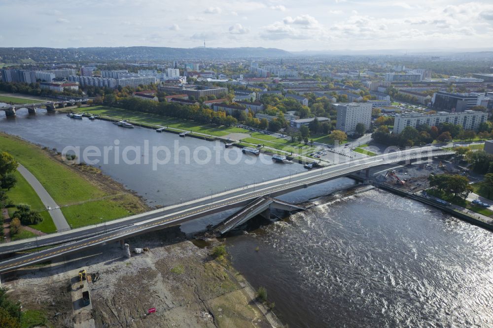 Dresden from the bird's eye view: Concrete segments of the collapsed river bridge structure for crossing the Elbe Carolabruecke on the street Carolabruecke in Dresden in the federal state of Saxony, Germany, have fallen down into the riverbed of the Elbe