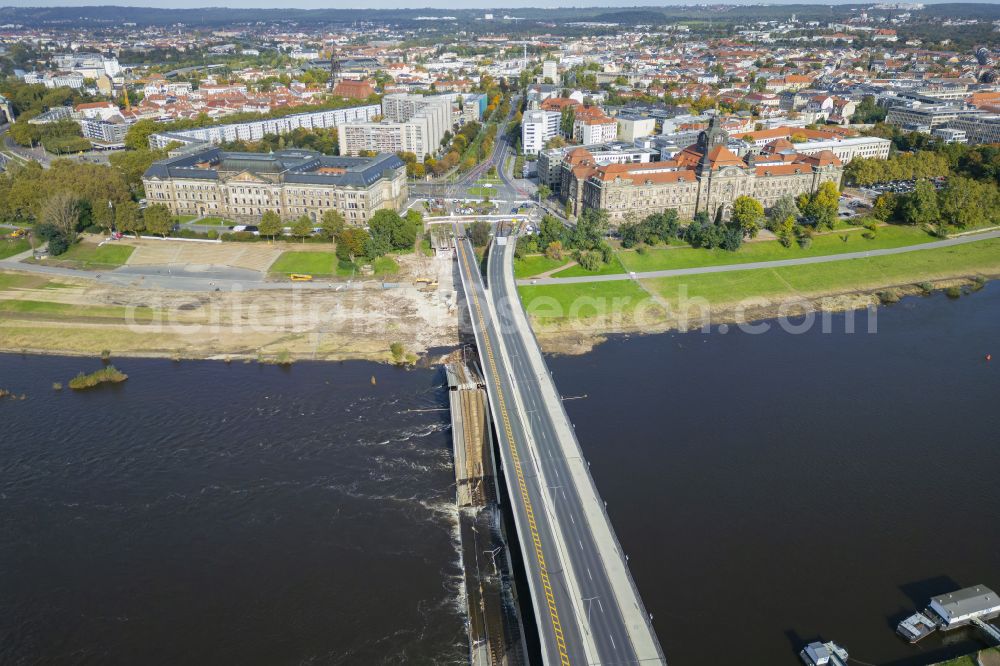 Dresden from above - Concrete segments of the collapsed river bridge structure for crossing the Elbe Carolabruecke on the street Carolabruecke in Dresden in the federal state of Saxony, Germany, have fallen down into the riverbed of the Elbe