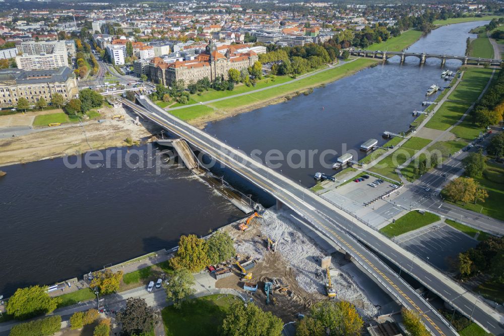 Aerial image Dresden - Concrete segments of the collapsed river bridge structure for crossing the Elbe Carolabruecke on the street Carolabruecke in Dresden in the federal state of Saxony, Germany, have fallen down into the riverbed of the Elbe