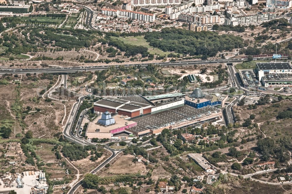 Aerial photograph Almada - Building of the shopping center Almada Forum on R. Sergio Malpique in Almada in Setubal, Portugal