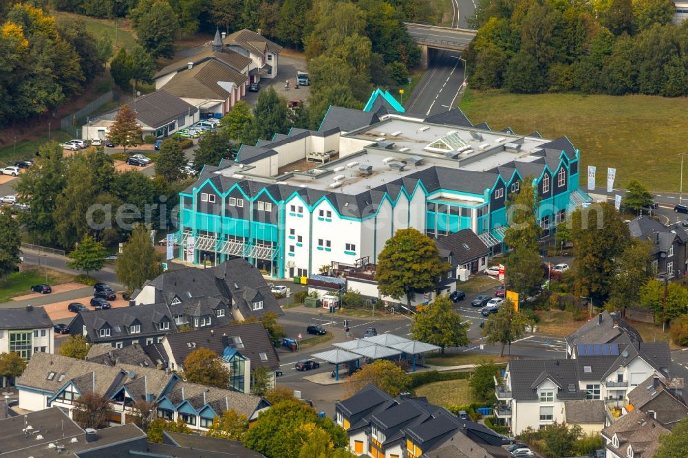 Wilnsdorf from the bird's eye view: Shopping centre, clothing shop of Bruno Kleine GmbH & Co. KG in Wilnsdorf, North Rhine-Westphalia, Germany