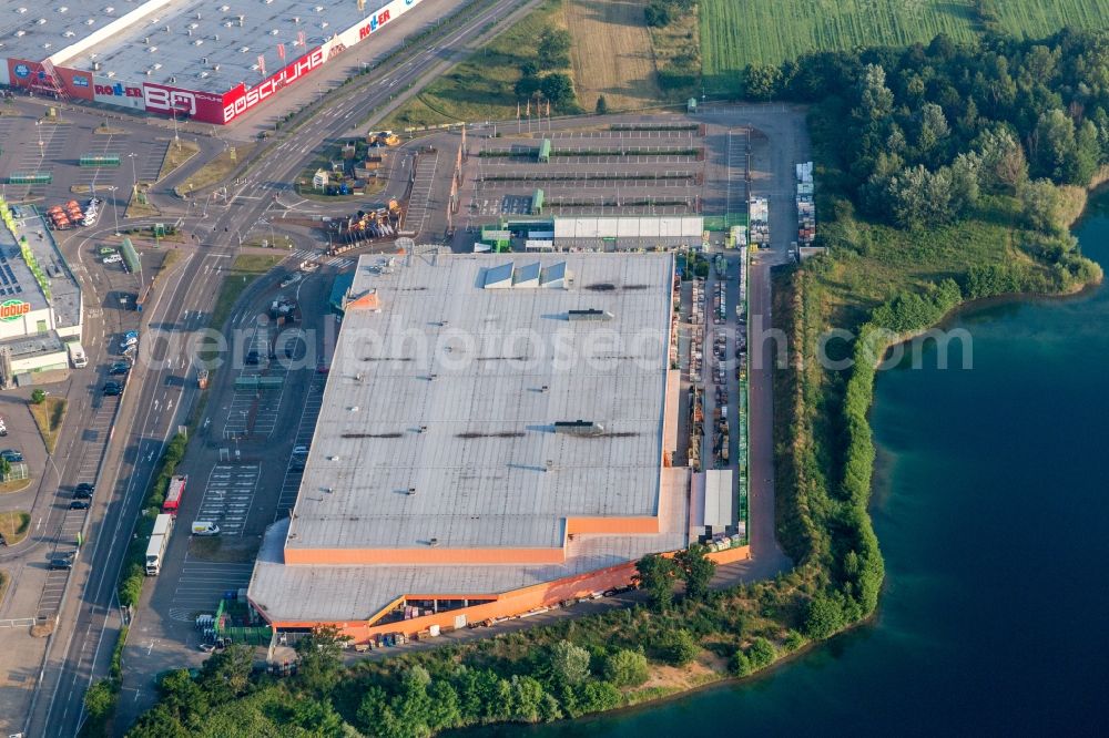 Waghäusel from the bird's eye view: Building of the shopping center Globus Baumarkt Wiesental in Wiesental in the state Baden-Wurttemberg, Germany