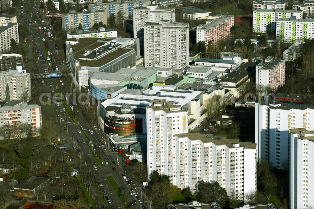 Aerial photograph Berlin - Building complex of the Gropius Passagen shopping center and high-rise buildings of the Gropiusstadt residential complex in the Buckow district in Berlin, Germany