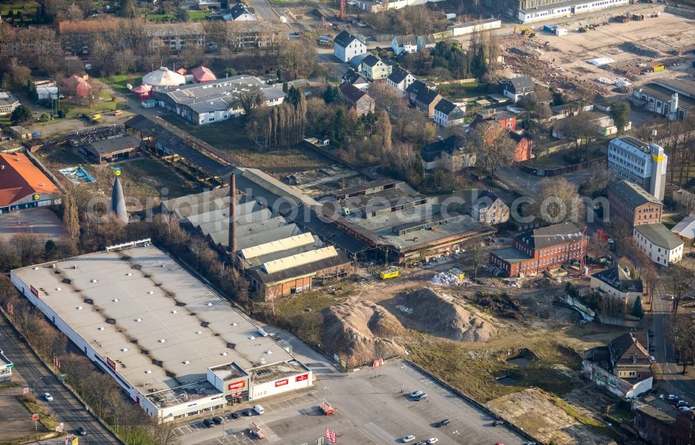 Herne from the bird's eye view: Building of the shopping center REWE Center on Bahnhofstrasse in Herne in the state North Rhine-Westphalia, Germany