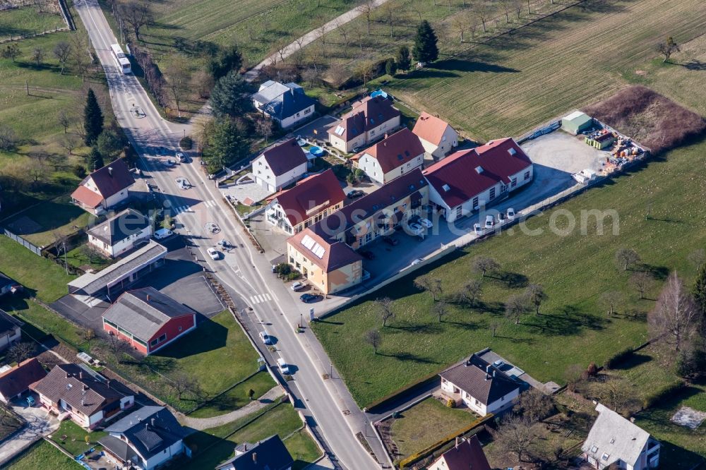 Aerial photograph Betschdorf - Building of the shopping center S.c.e. Henri Strohm in Betschdorf in Grand Est, France