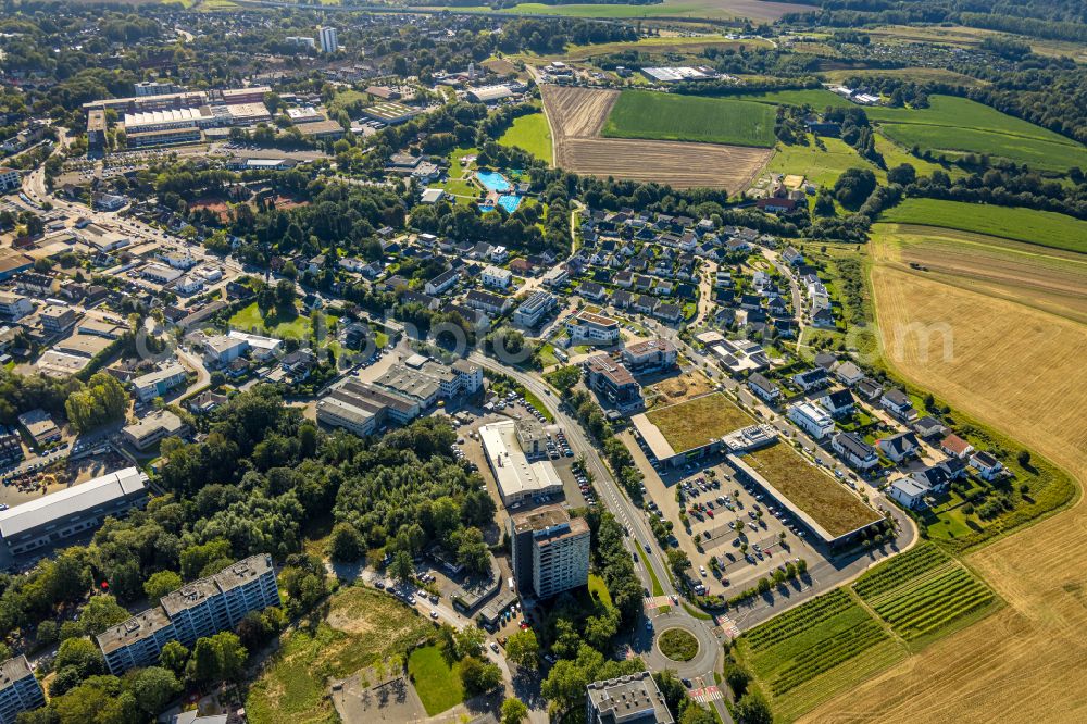 Aerial image Heiligenhaus - Building of the shopping center and Supermarkt- Filiale von Rewe on Hoeseler Strasse in Heiligenhaus in the state North Rhine-Westphalia, Germany