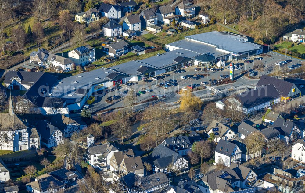 Eslohe (Sauerland) from the bird's eye view: Building of the shopping center on Toelckestrasse in Eslohe (Sauerland) in the state North Rhine-Westphalia, Germany