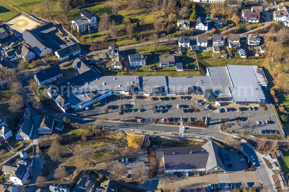 Aerial photograph Eslohe (Sauerland) - Building of the shopping center on Toelckestrasse in Eslohe (Sauerland) in the state North Rhine-Westphalia, Germany