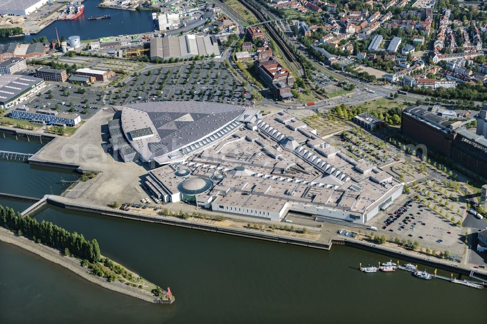 Aerial image Bremen - Building of the shopping center Waterfront on the river bank of Weser in the district Lindenhof in Bremen, Germany