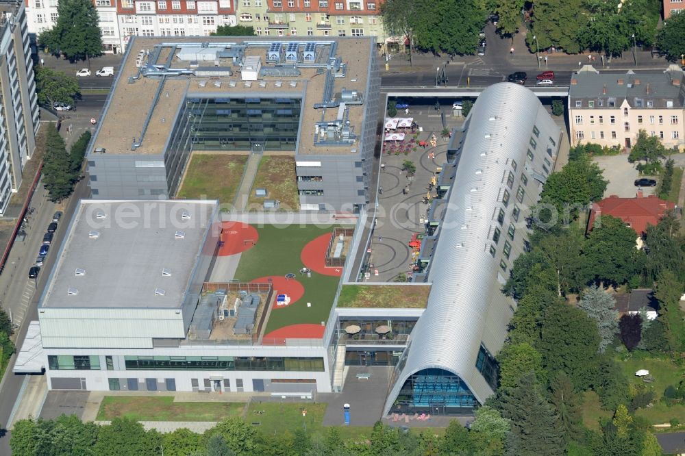 Berlin from the bird's eye view: Building of the shopping center Zehlendorfer Welle on Clayallee in the district Zehlendorf in Berlin, Germany