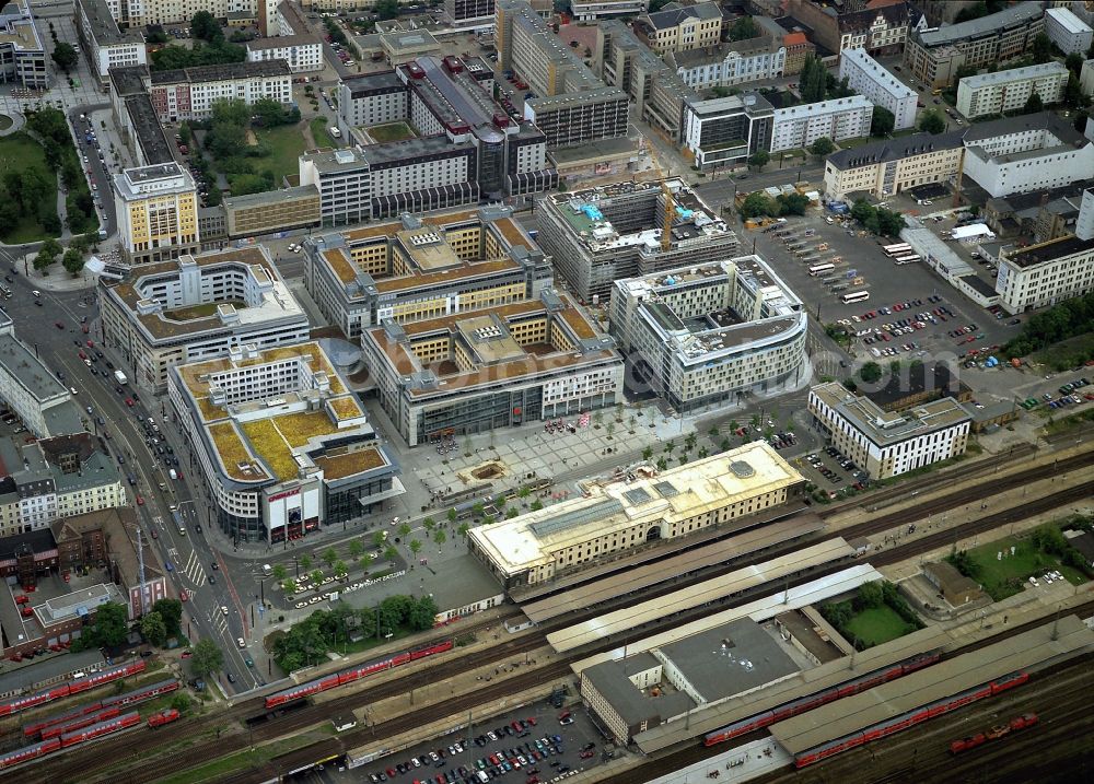 Magdeburg from above - The shopping center at the main station Magdeburg City Carre. The office and retail building complex opposite the station is operated by Cape Real Estate Management GmbH