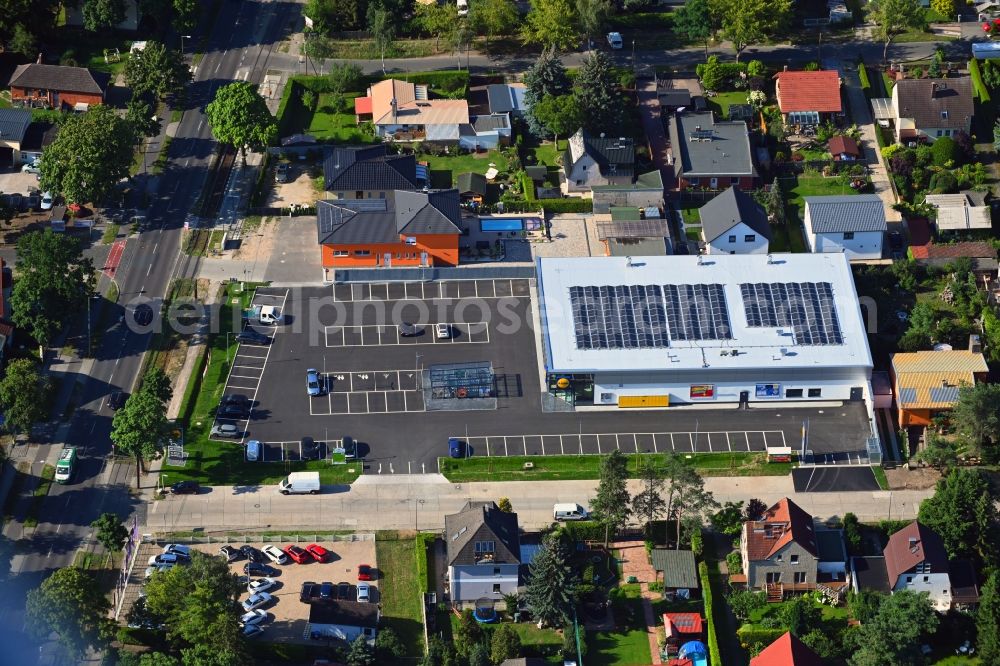 Aerial image Berlin - Shopping center LIDL on Raststatter Strasse corner Hultschiner Damm in the district Mahlsdorf in Berlin, Germany