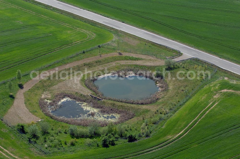 Aerial image GRAMZOW - Autobahnkreuz Uckermark mit Einmündung der Ortsumfahrung der Bundesstrasse B 166 westlich von Gramzow am Autobahnkreuz A20 / A11 (E28) im nördlichen Brandenburg. Landesbetrieb Straßenwesen Brandenburg (