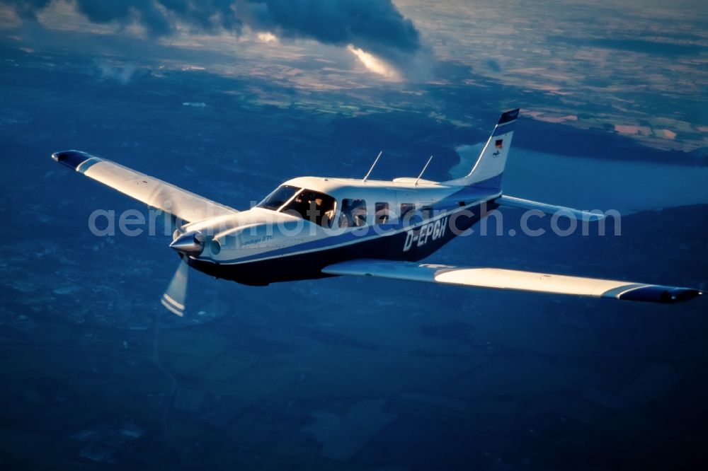 Flensburg from above - Single-engine business aircraft in the airspace in Flensburg in the state of Schleswig-Holstein