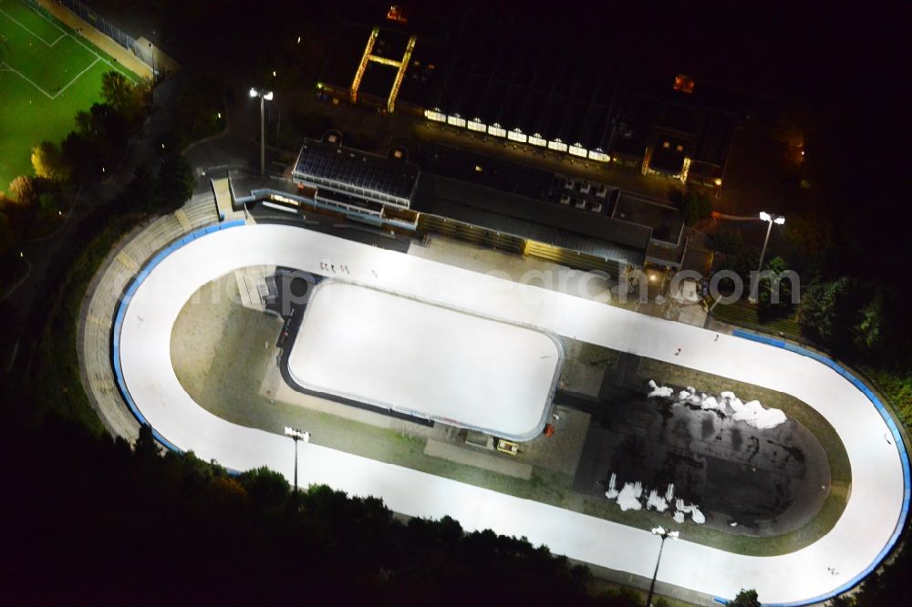 Aerial photograph Berlin Wilmersorf - Night image with a view over the rink in the Horst- Dohm- Icestadium directly right next to the stadium Wilmersdorf in Wilmersdorf in Berlin