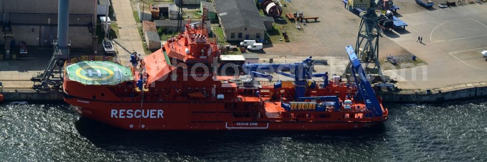 Wismar from above - Ice breaking rescue ships in front of Nordic Yards in Wismar in the state of Mecklenburg - Western Pomerania. The distinct red ships - Multipurpose Rescue and Salvage Vessel (MPRSV) - were ordered by the Russian Ministry of Transportation