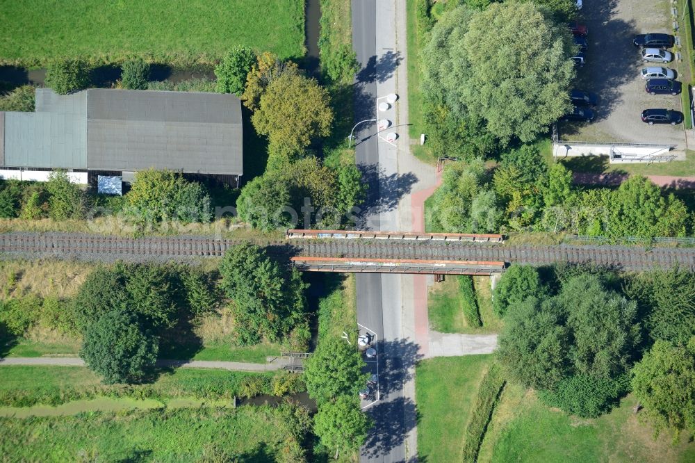 Hamburg from above - Railway viaduct over the Finkenwerder Landscheideweg road in Hamburg-Finkenwerder. A project of the Hamburg Port Authority HPA