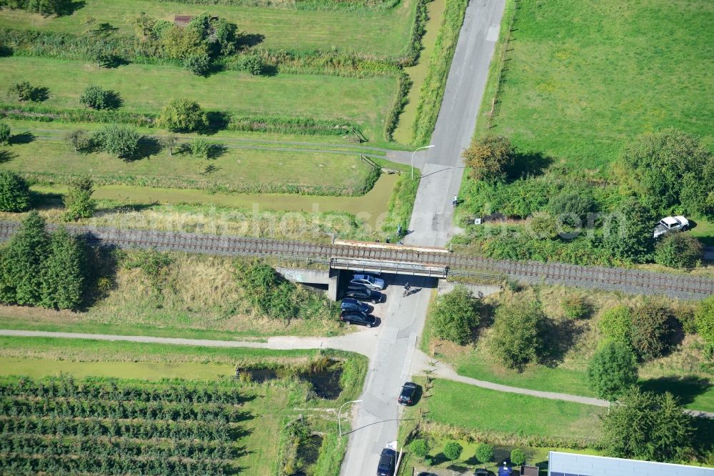 Aerial photograph Hamburg - Railway viaduct over the Koeterdamm road in Hamburg-Finkenwerder. A project of the Hamburg Port Authority HPA