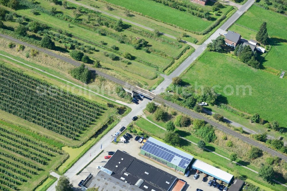 Aerial photograph Hamburg - Railway viaduct over the Koeterdamm road in Hamburg-Finkenwerder. A project of the Hamburg Port Authority HPA